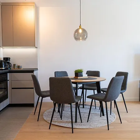 Cosmopolitan By Belmont Realty *